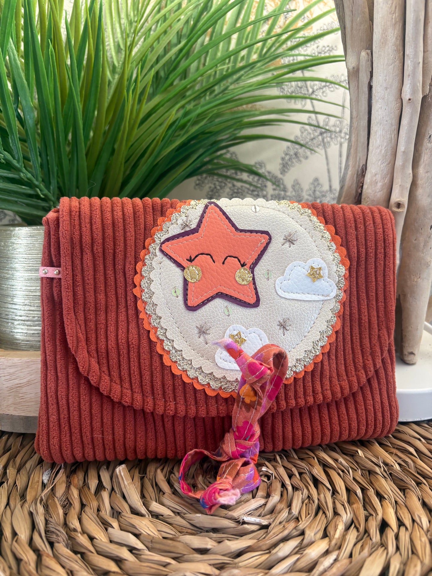 Pochette à barrettes